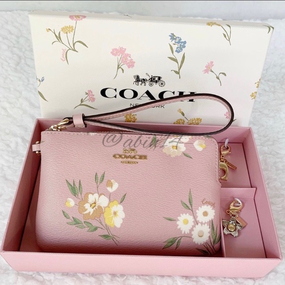 Coach Handbags - NWT Boxed Coach Wristlet with Charms